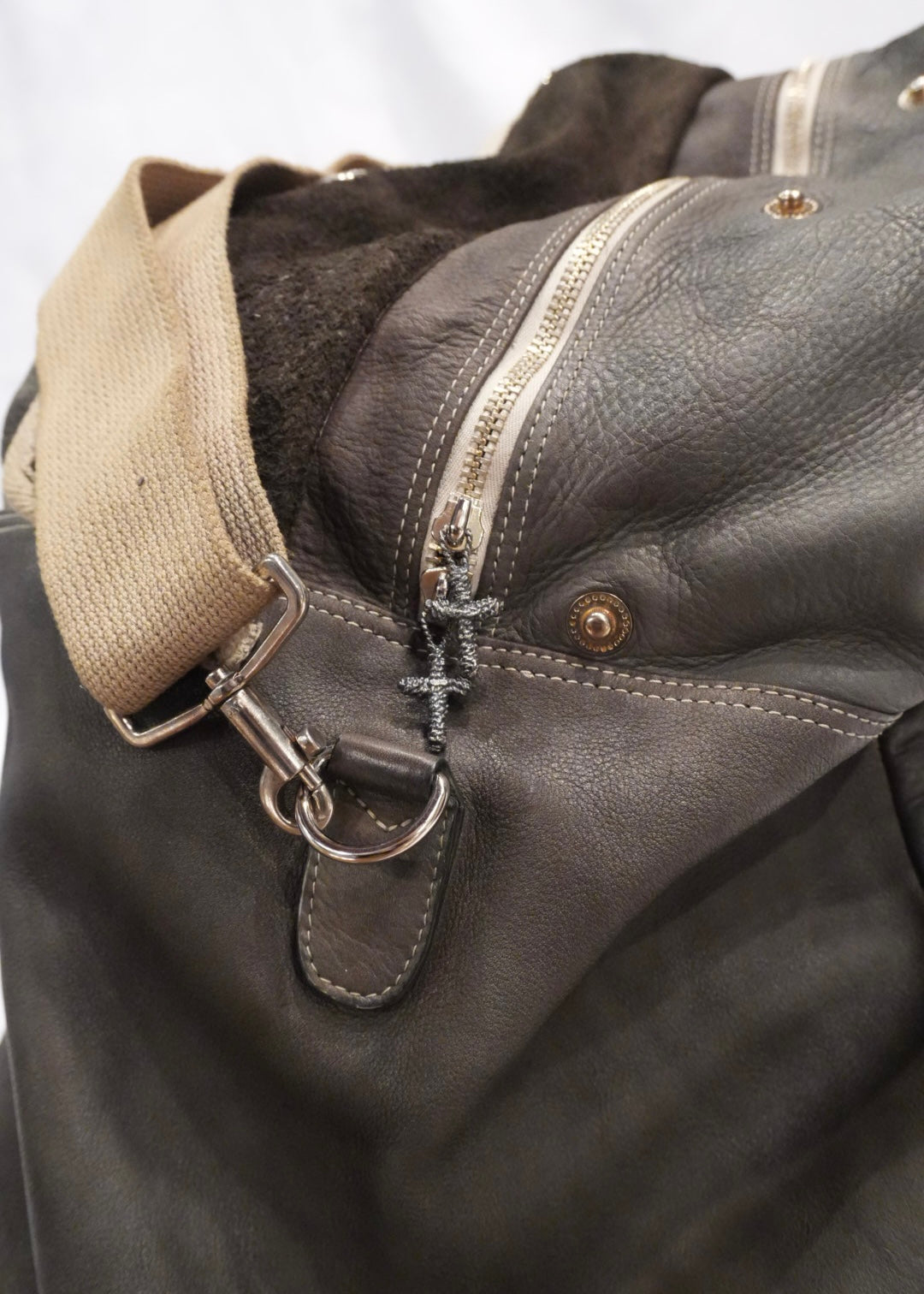 TAXED dyed leather bag