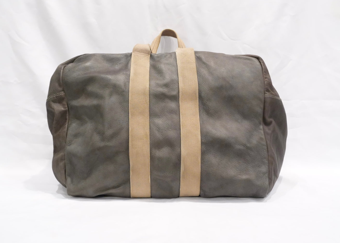 TAXED dyed leather bag