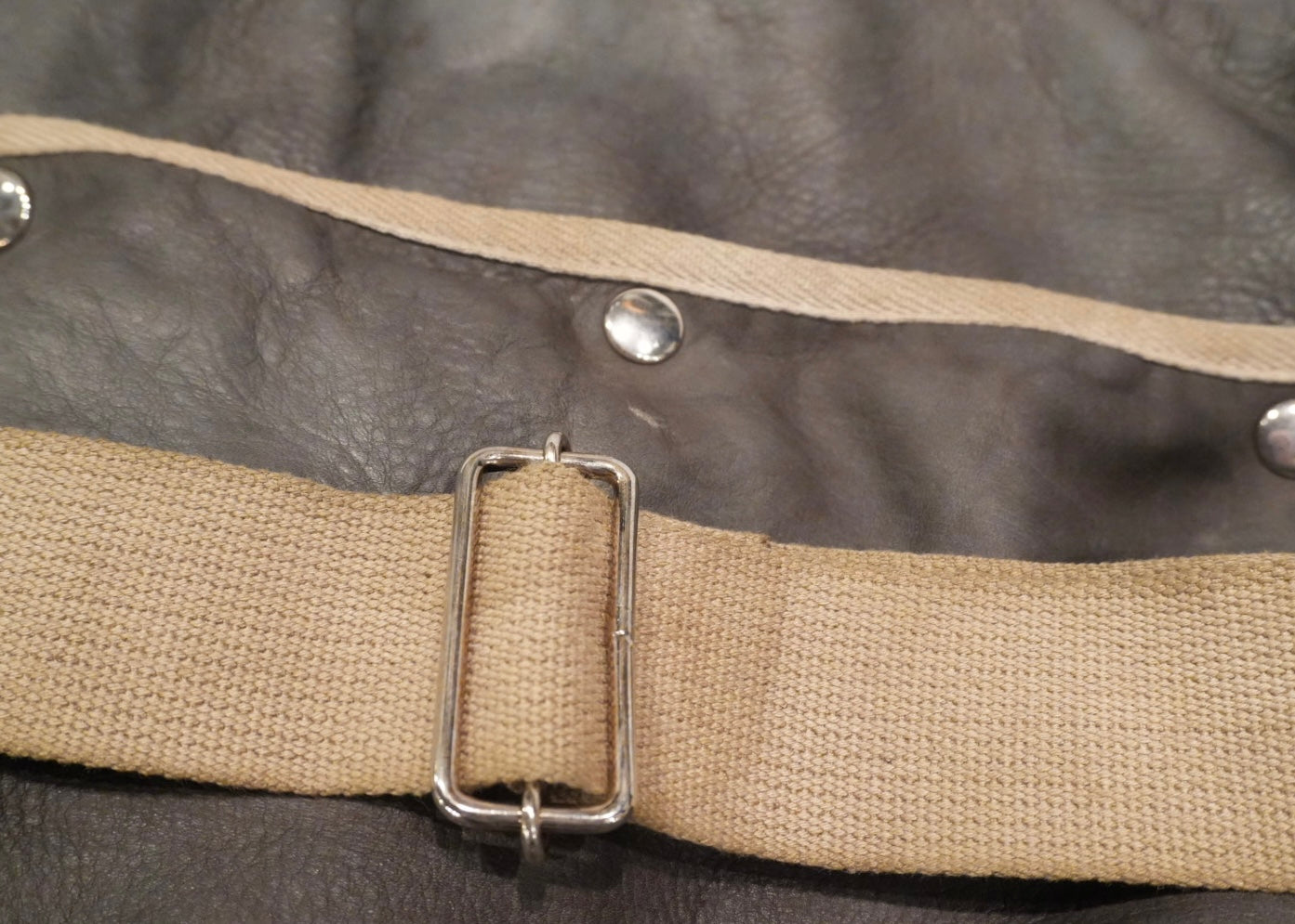 TAXED dyed leather bag
