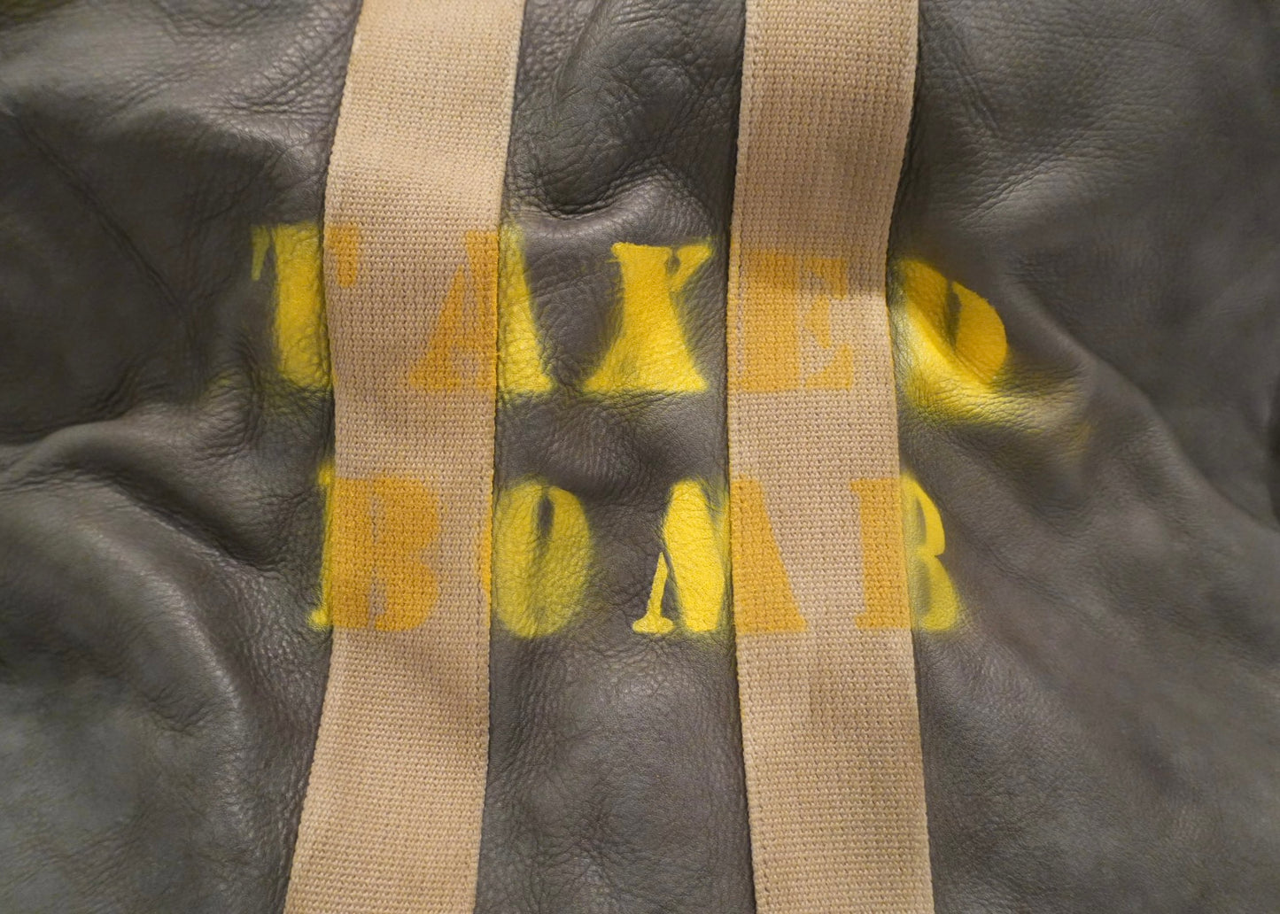TAXED dyed leather bag