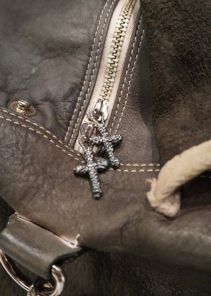 TAXED dyed leather bag